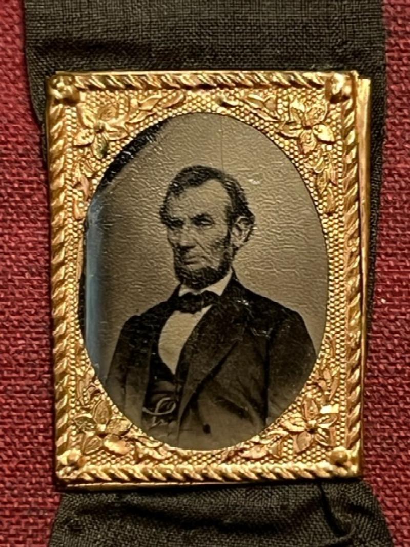 Image for Small Abraham Lincoln ferrotype with mourning ribbon